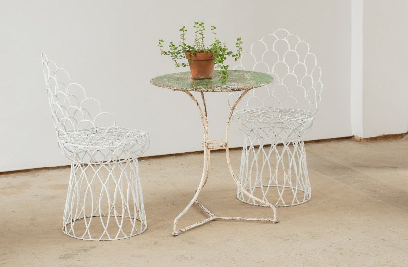 A Pair Of Scalloped Iron Peacock Chairs 